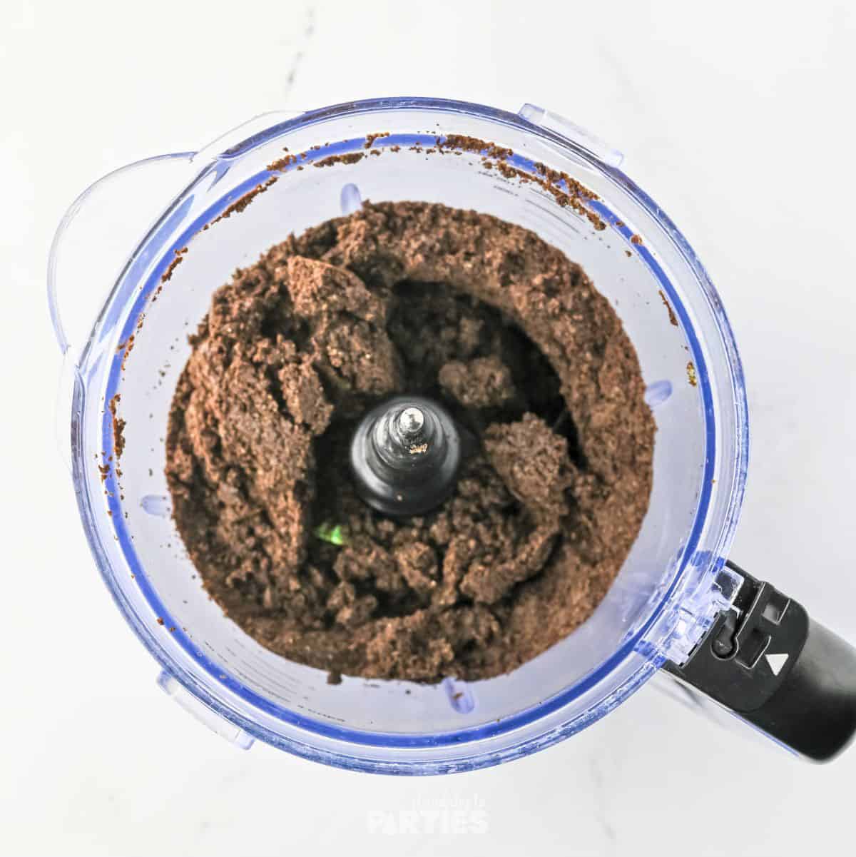 Oreo cookies crumbled in a food processor.