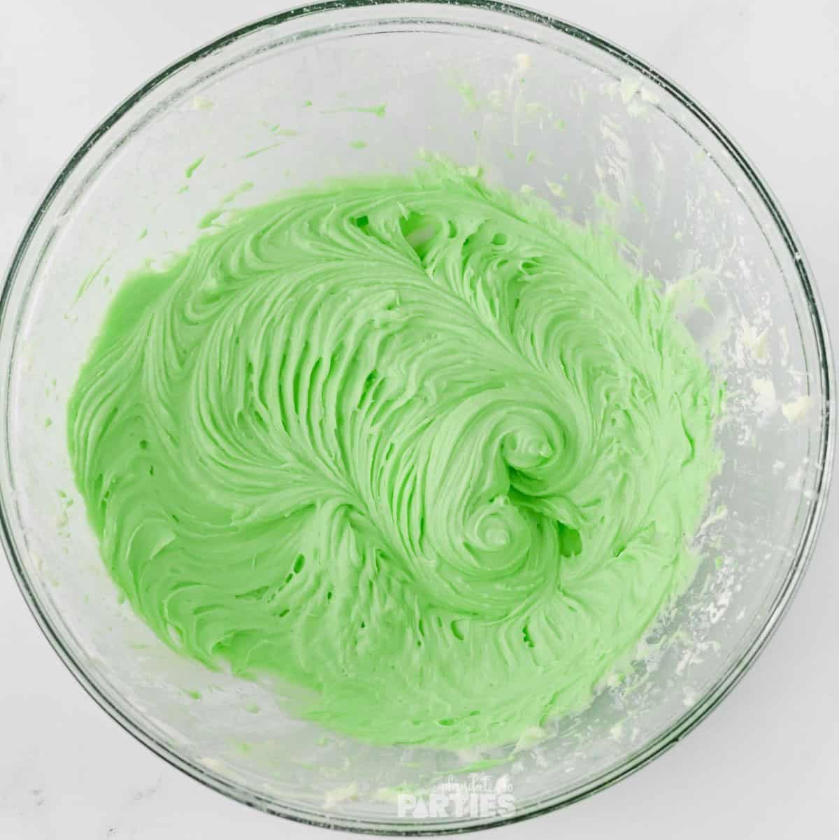 Sweetened cream cheese colored green.
