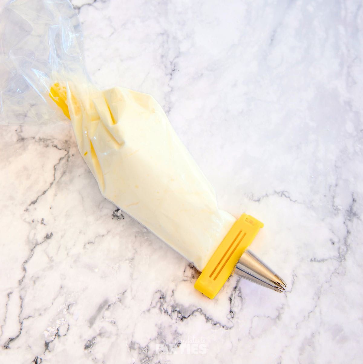 Whipped cream in a piping bag.
