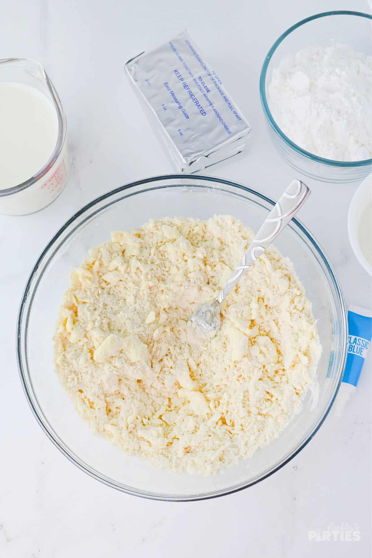 Butter and flour combined in a bowl.