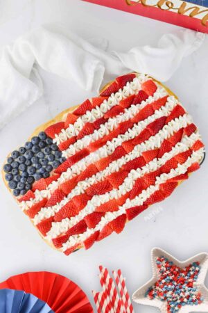 Fruit Flag Cookie Pizza on a white surface.