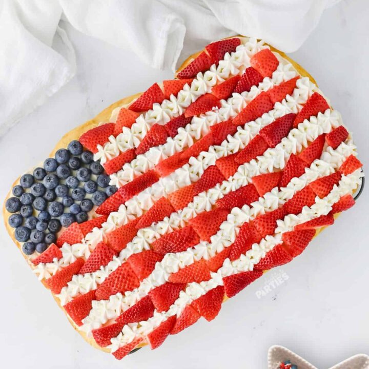 Fruit Flag Cookie Pizza on a white surface.