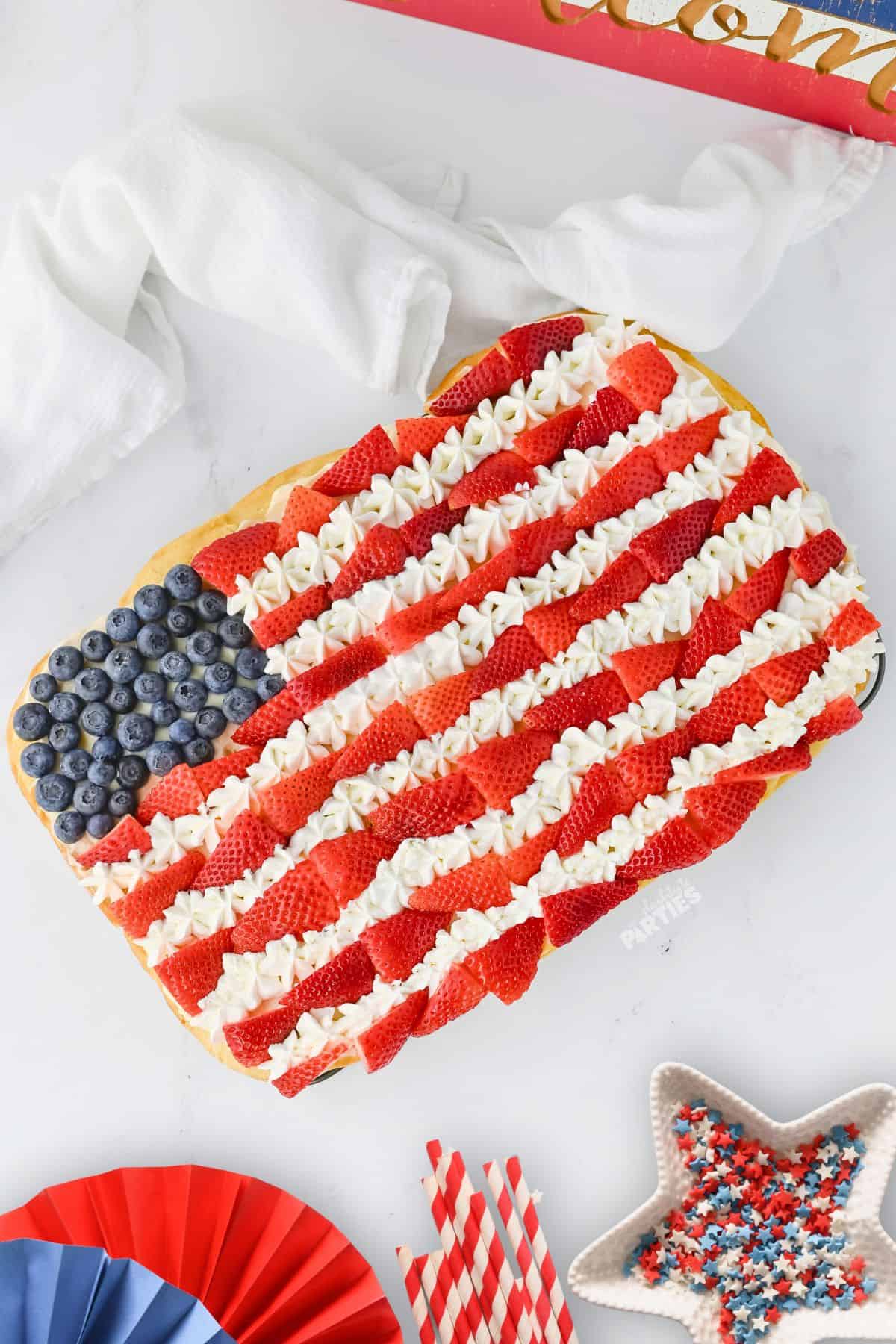 Fruit Flag Cookie Pizza on a white surface.
