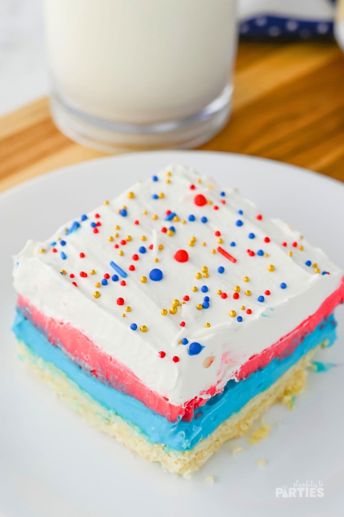 Patriotic layered cheesecake on a plate.