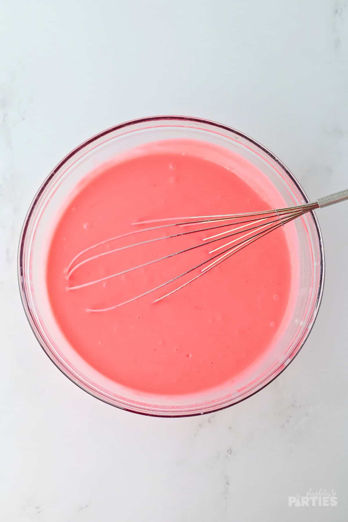 Red pudding mixed in a bowl.