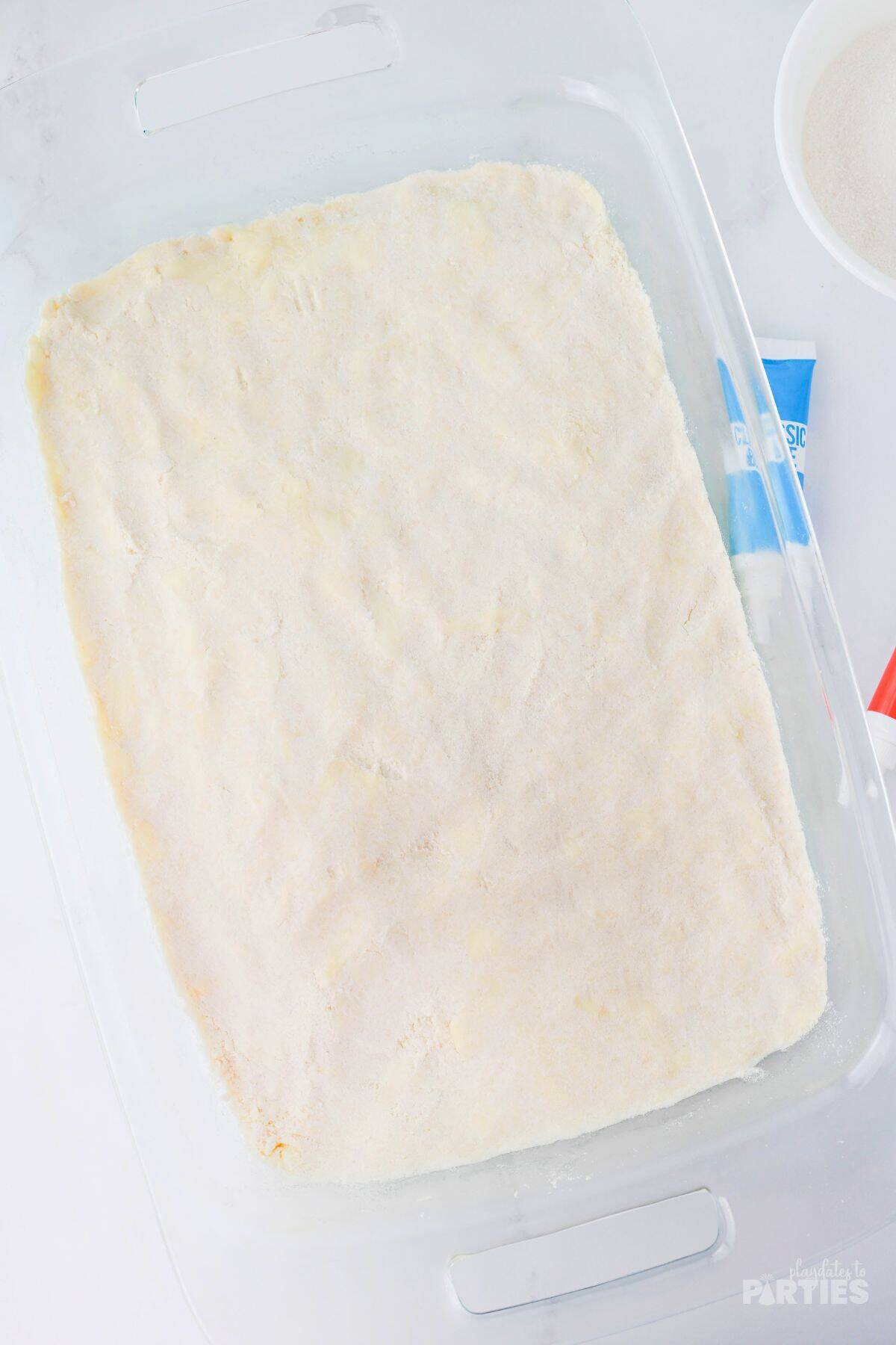The base layer baked in a glass dish.