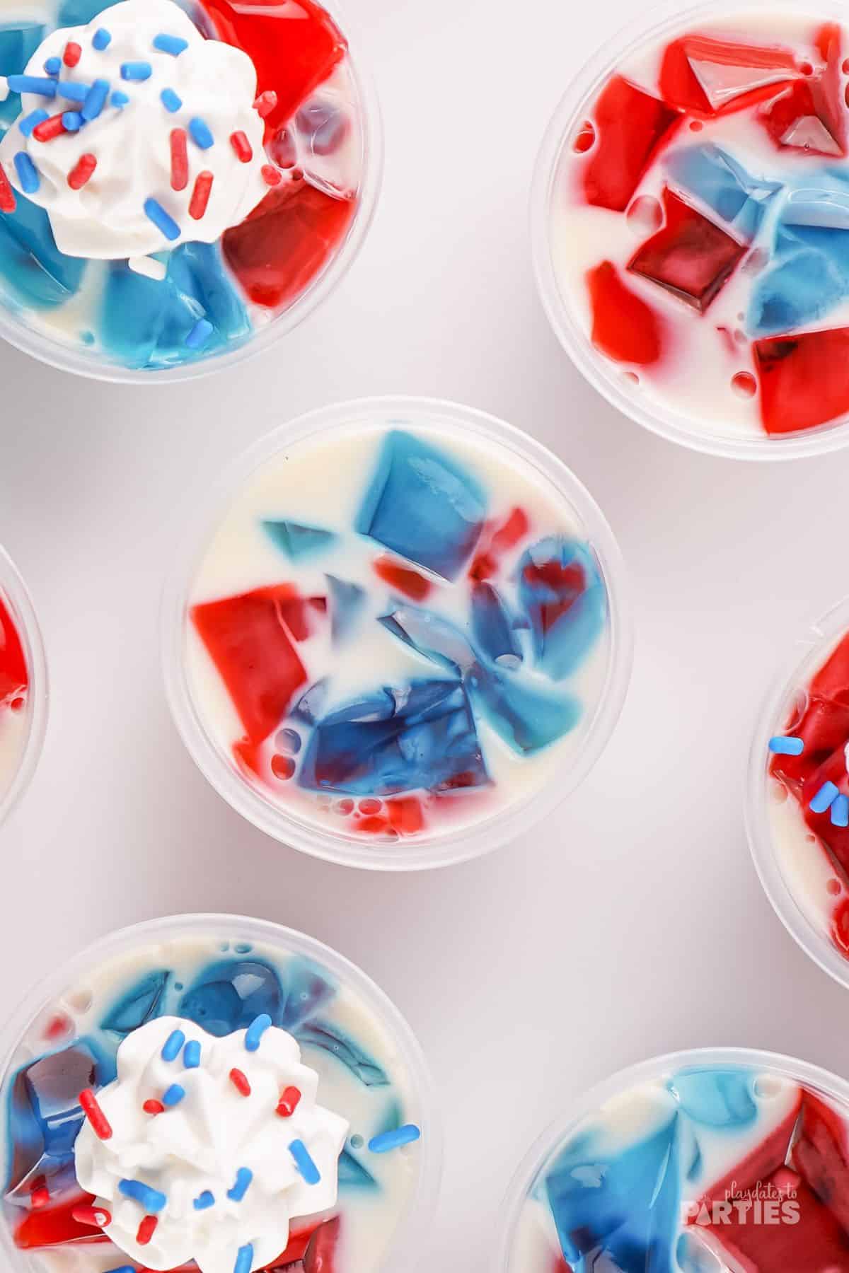 The top of the jello cups shows the stained glass effect with the red white and blue jello.