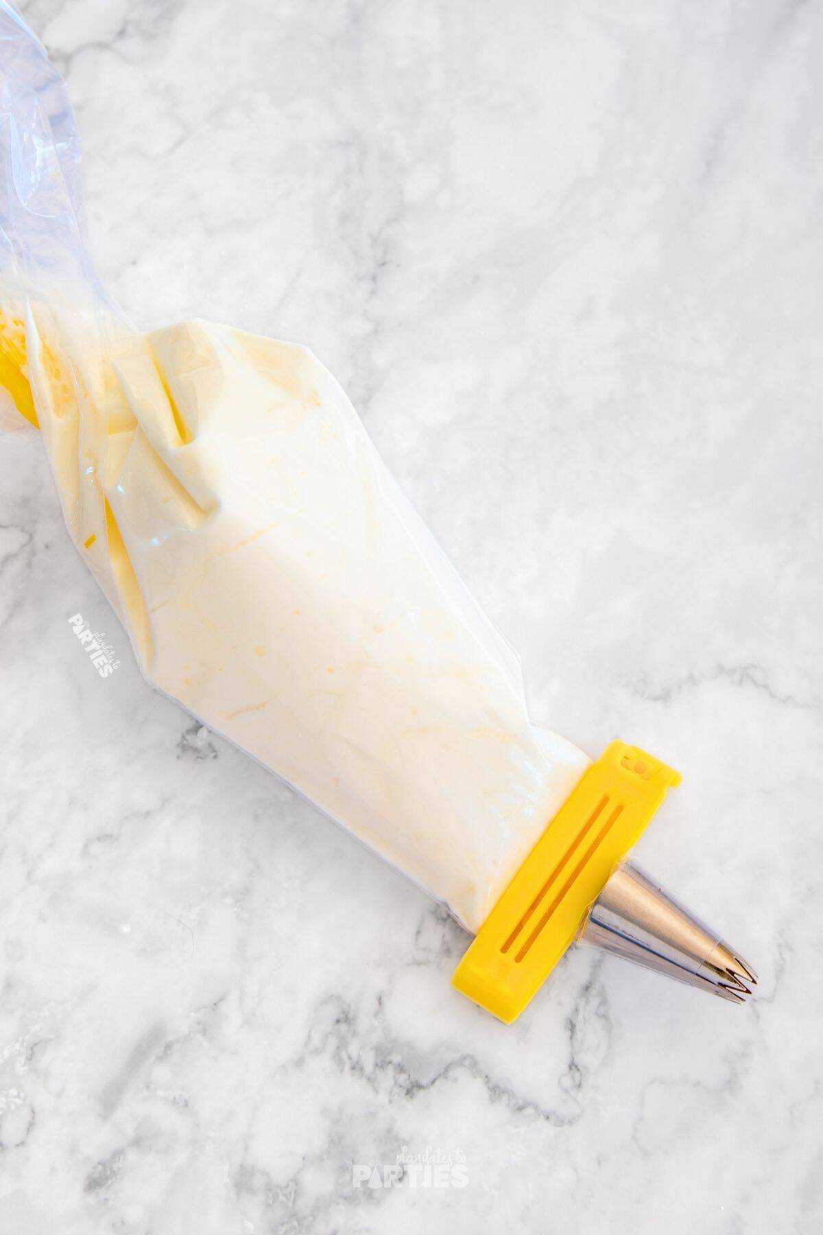 Whipped cream in a piping bag.