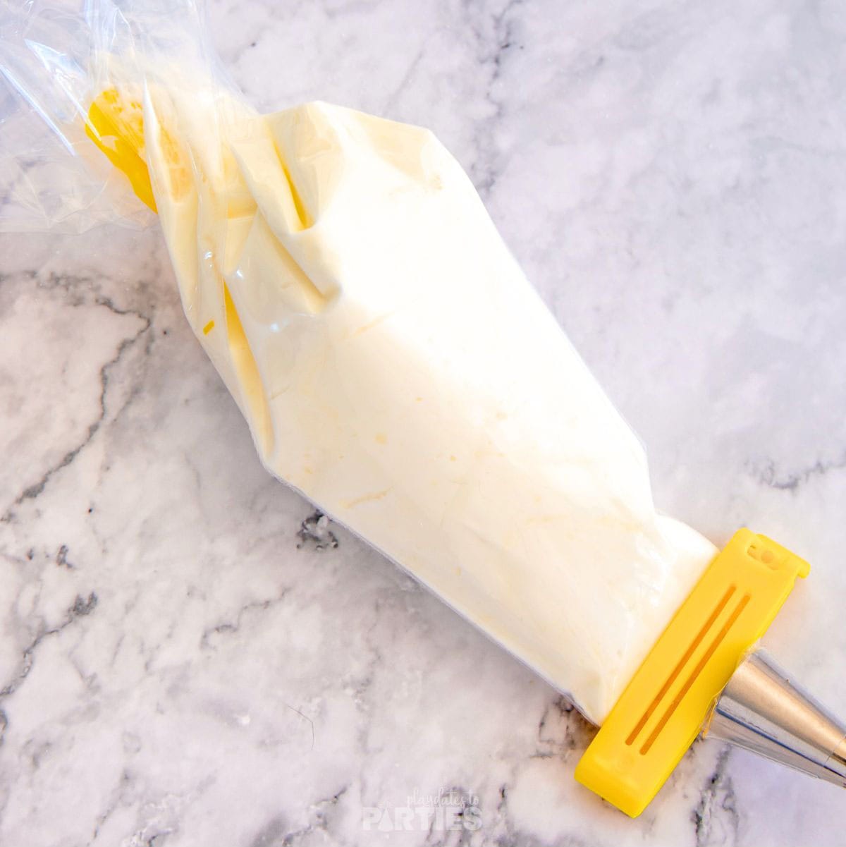 Sour cream in a piping bag.